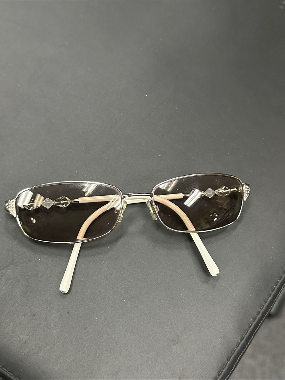 Swarovski Silver Frame Sunglasses w/ rhinestones Lenses